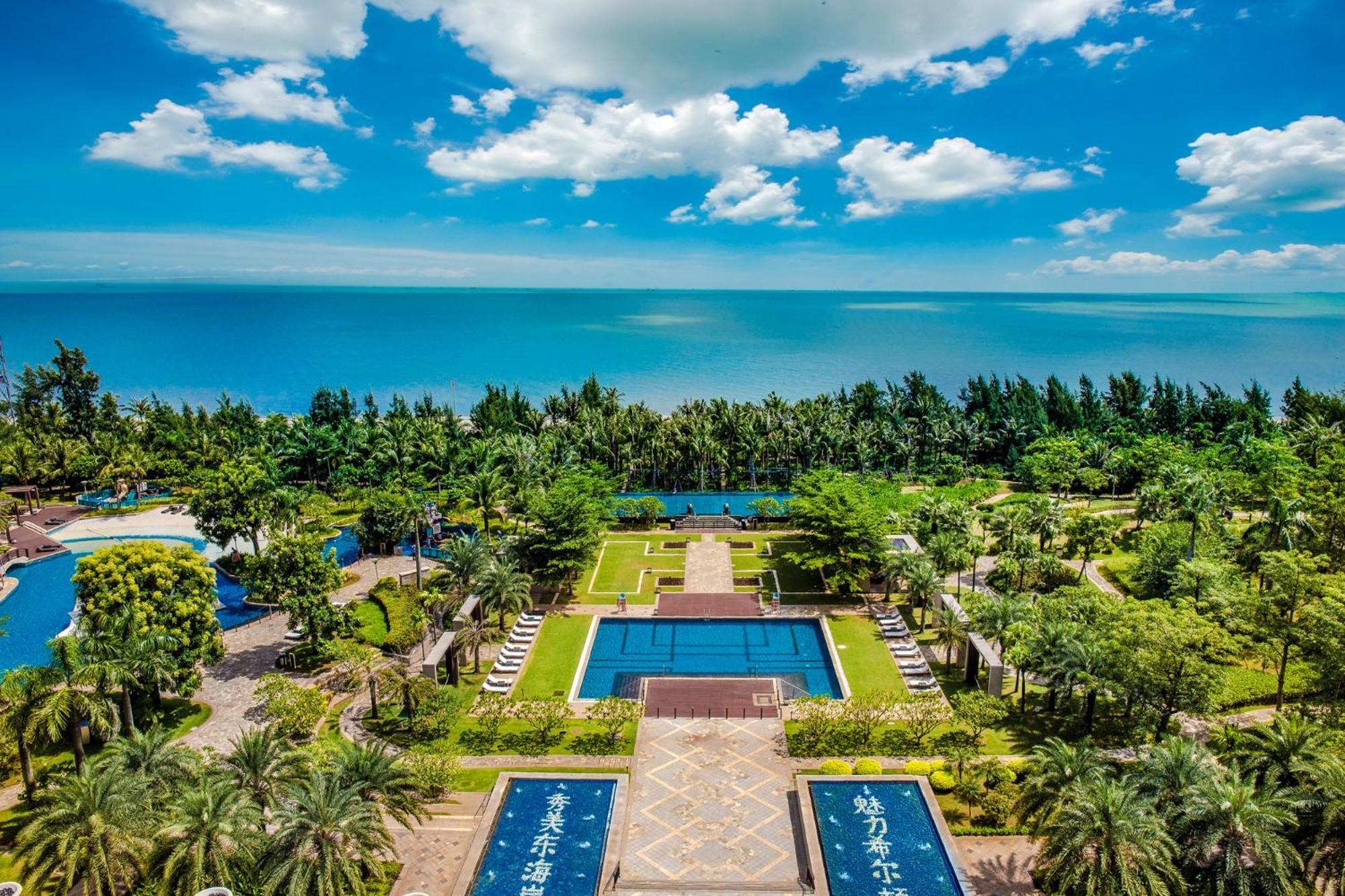 Hilton Haikou Meilan - Beachfront Hotel Экстерьер фото